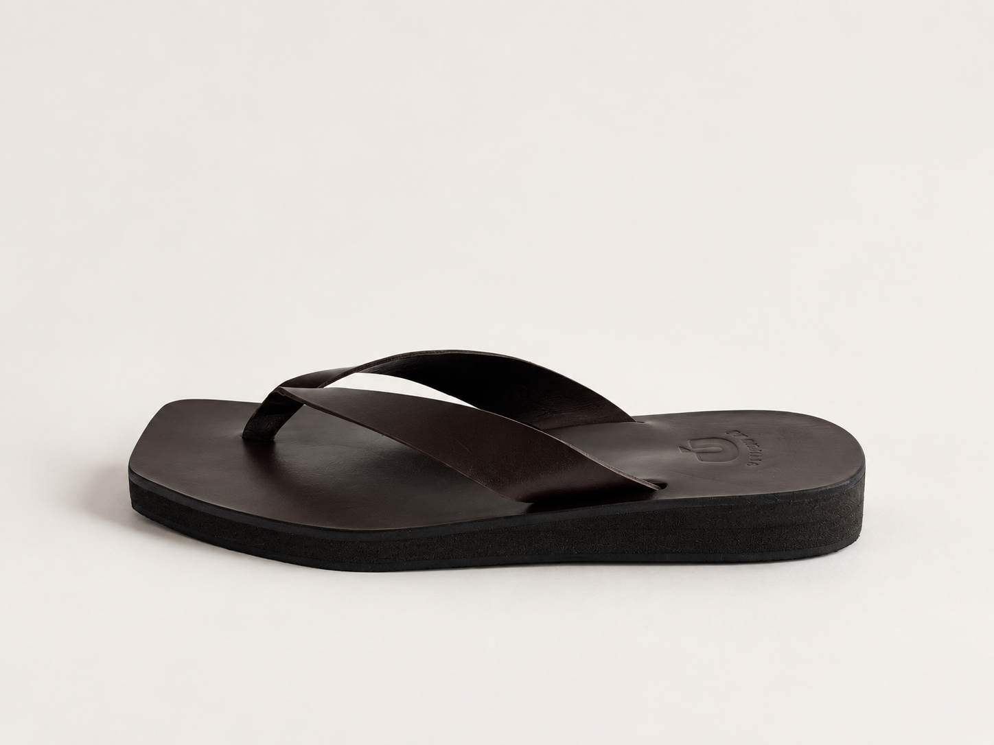 MinimalistDarkLeatherFlip-FlopProductPhoto.png